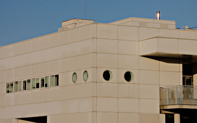 Low angle view of building against blue sky