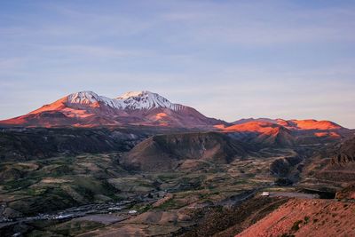 Scenic view of mountain range against sky