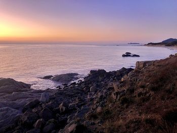 Scenic view of sea against sky during sunset