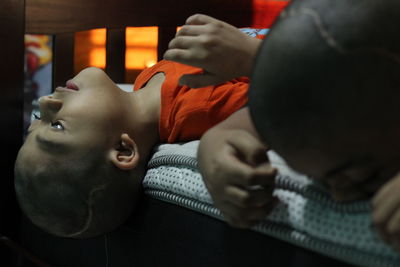 Close-up of boy lying down