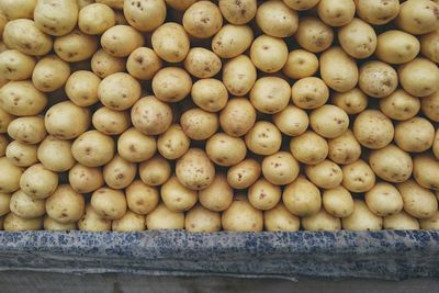 Directly above shot of potatoes for sale in market