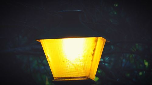Close-up of illuminated light bulb