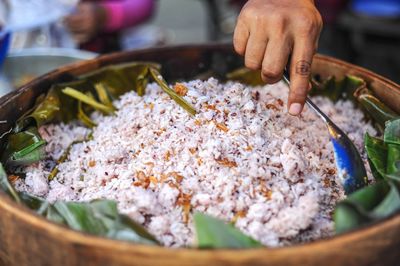 Close-up of person preparing food