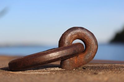 Close-up of rusty metal against clear sky