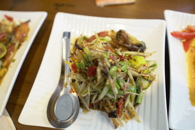 High angle view of meal served on table