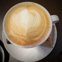 Close-up of cappuccino on table