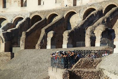 Group of people in front of historical building