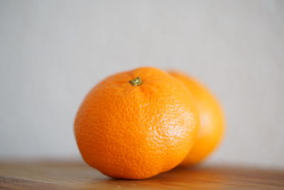 Close-up of orange fruit on table