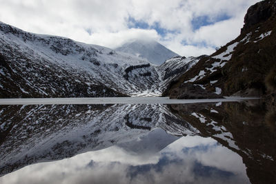 The mount ngauruhoe volcano reflected in the upper tama lake in the tongariro national park. 