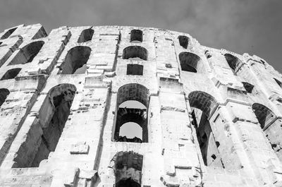 Low angle view of old temple against sky