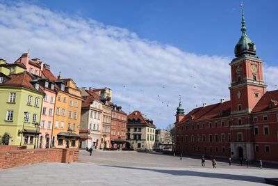 View of buildings in city against sky