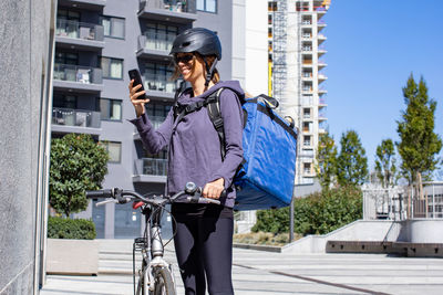 Woman delivery person taking order