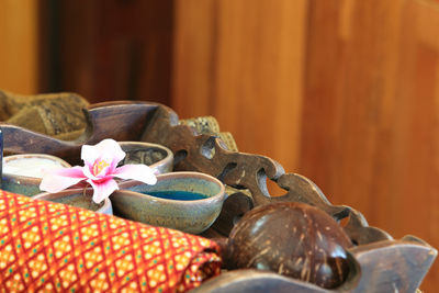 Close-up of textile and equipment on table at spa