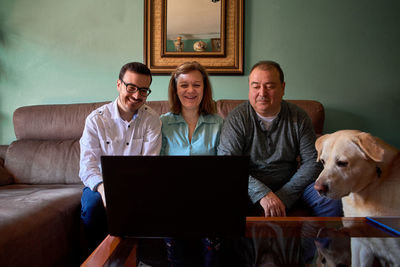 Family talks online in their living room