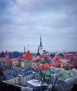 View of buildings in city against sky