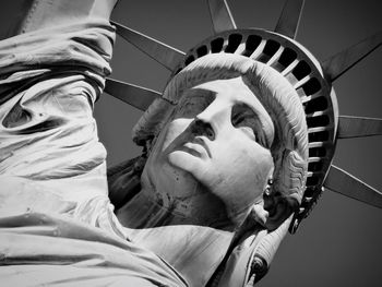 Low angle view of statue against sky