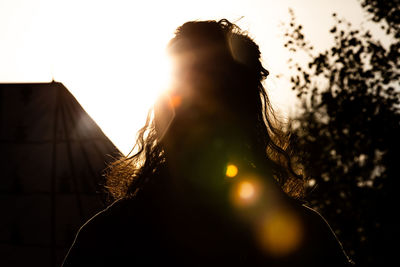 Portrait of silhouette woman against sky during sunset