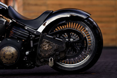 Close-up of motorcycle on street