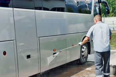 Rear view of man standing on street