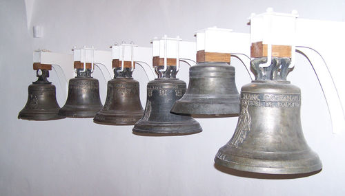 Close-up of bells against gray background