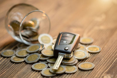 High angle view of coins on table