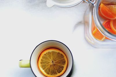 Close-up of drink in cup on snow