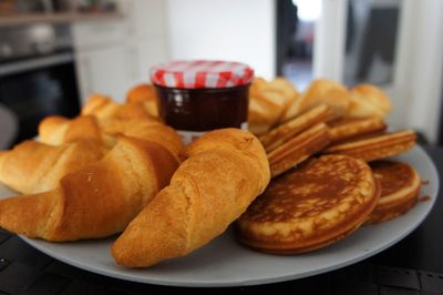 Close-up of breakfast served in plate on table