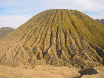 Scenic view of volcanic landscape against sky