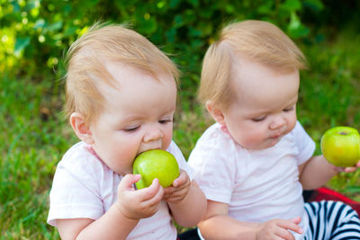 Cute boy with fruits