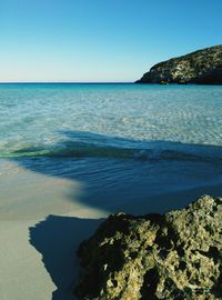 Scenic view of sea against clear sky