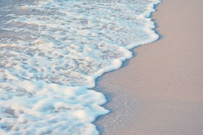 Close-up of snow on beach