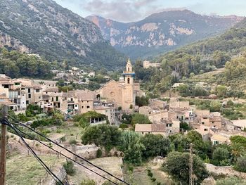 High angle view of townscape and mountains