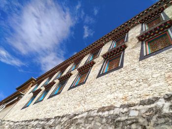 Low angle view of old building against sky