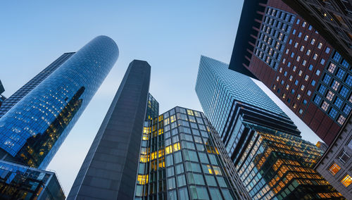 Low angle view of modern buildings against clear sky