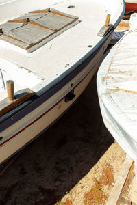 High angle view of boats moored on shore