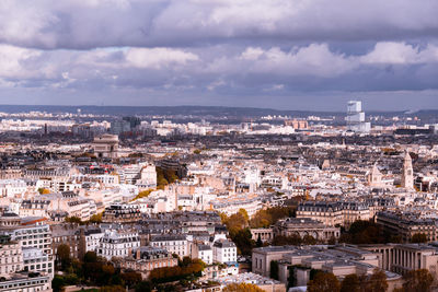 High angle view of city against cloudy sky
