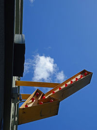 Low angle view of built structure against blue sky