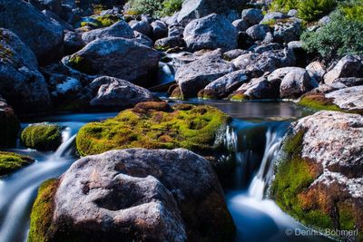 Stream flowing through rocks