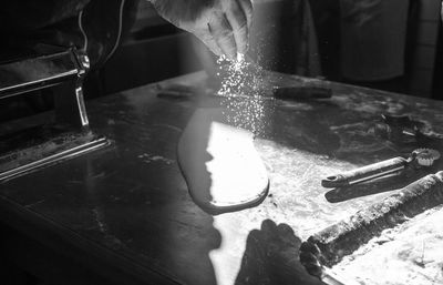 Close-up of person preparing food