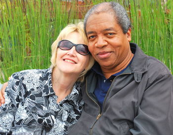 Portrait of smiling man and woman outdoors