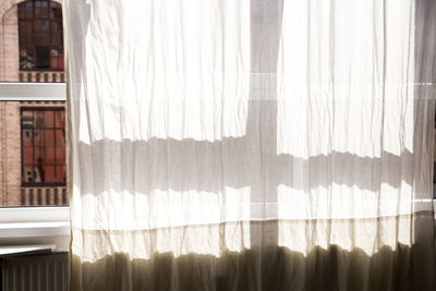 White curtain on window at home