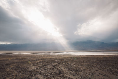 View of landscape against cloudy sky