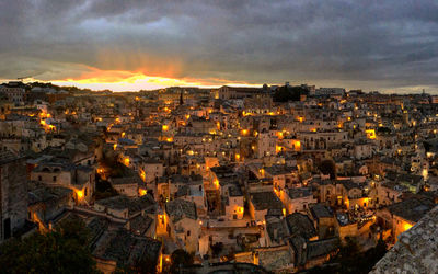 High angle view of illuminated buildings in city