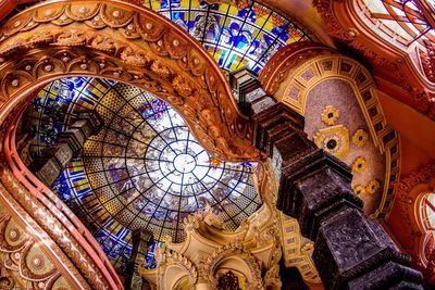 Low angle view of designed ceiling in building