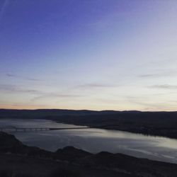 Scenic view of silhouette mountain against sky during sunset