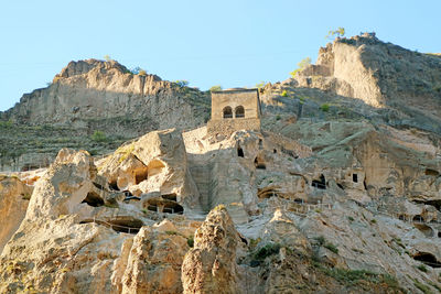 Vardzia medieval cave city with church on erusheti mountain near aspindza town, southern georgia