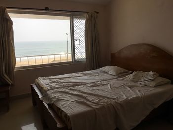 Scenic view of sea seen through home window