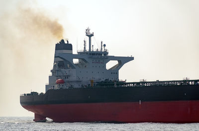 View of ship in sea against sky