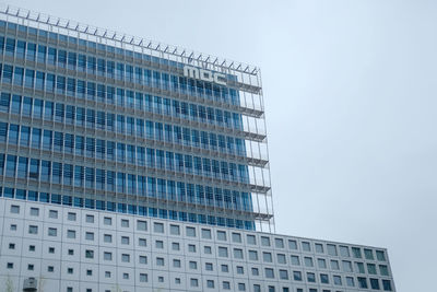 Low angle view of modern building against clear sky