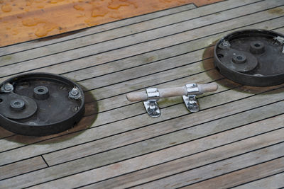 High angle view of old wheel on table